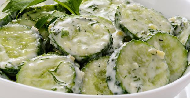 Fresh cucumber salad with yogurt and herbs.