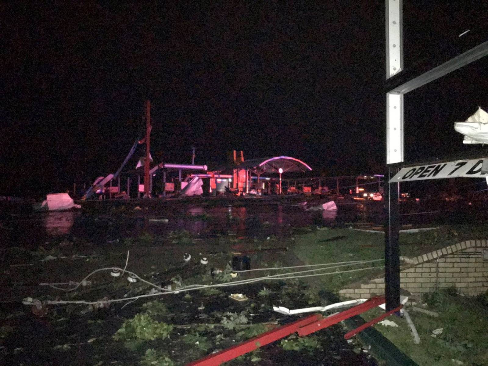 Damage is seen on a street after a tornado in Jefferson City