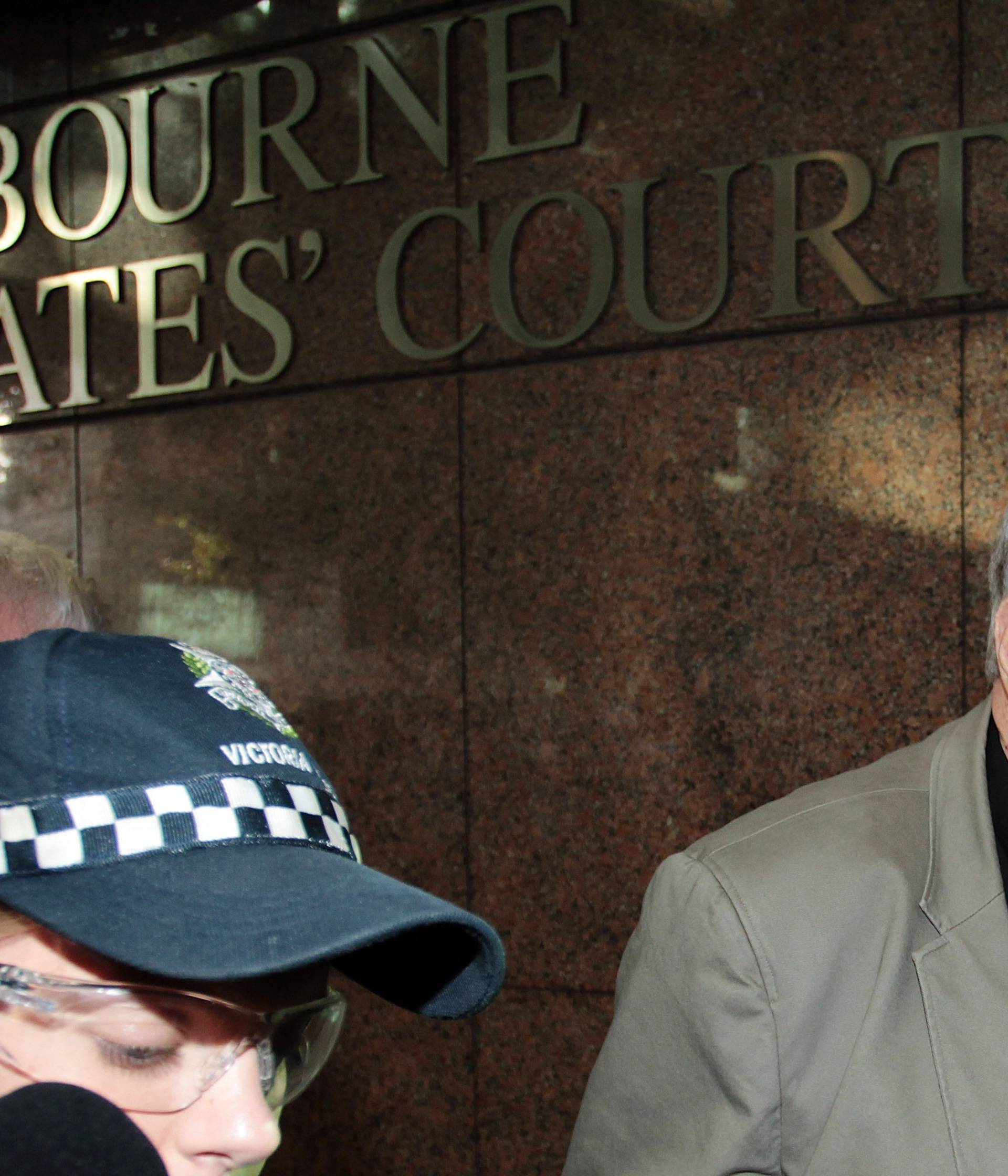 Cardinal George Pell arrives at the Melbourne Magistrates Court in Melbourne