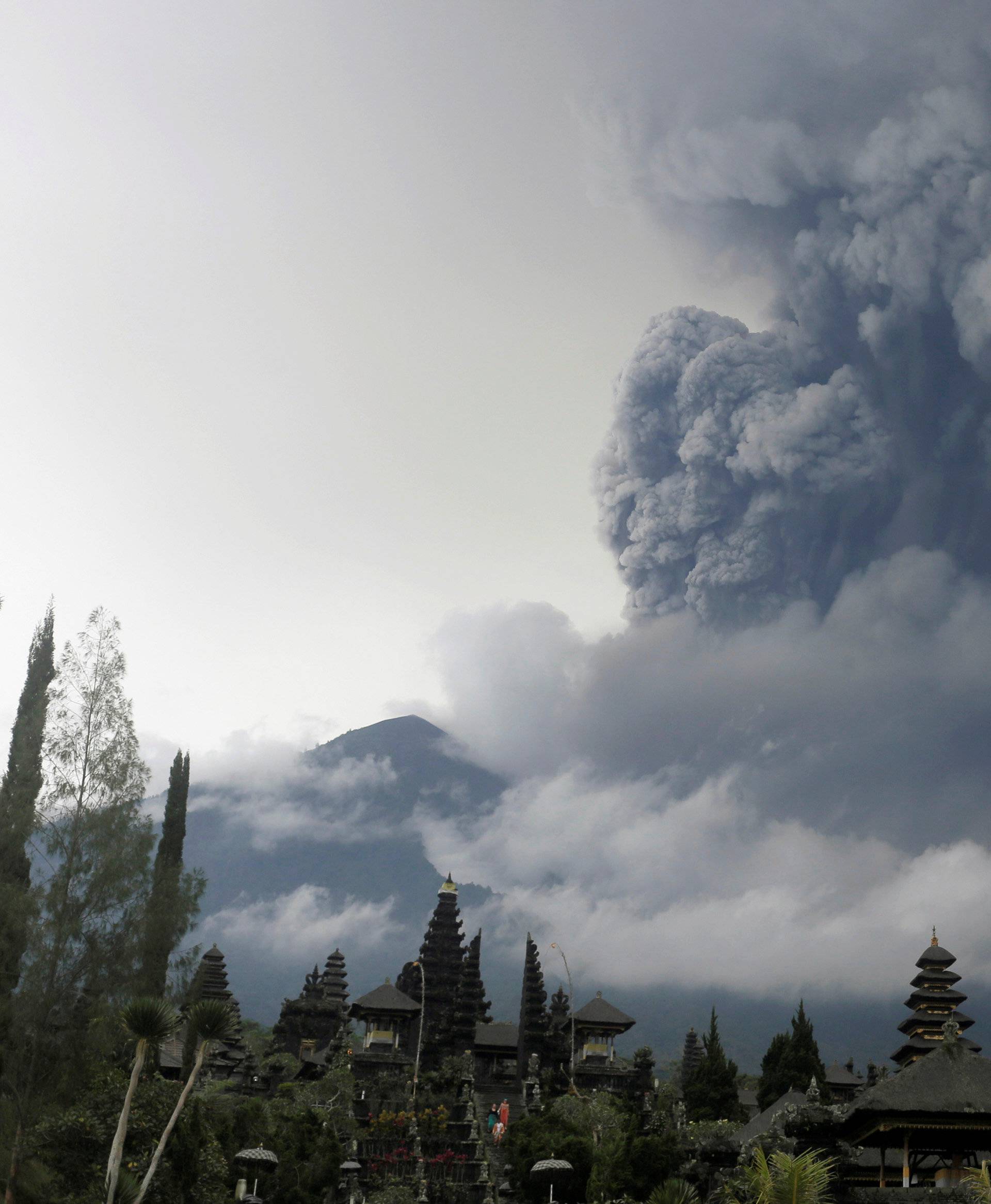 Mount Agung volcano erupts as seen from Besakih Temple in Karangasem, Bali