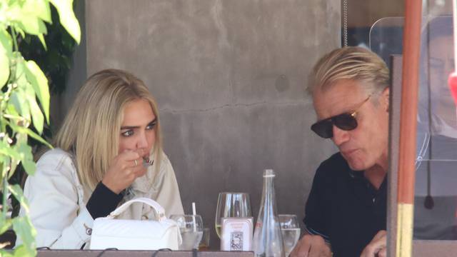 Dolph Lundgren 62 and his 38 years younger fiance Emma Krokdal lunch together at Il Pastio