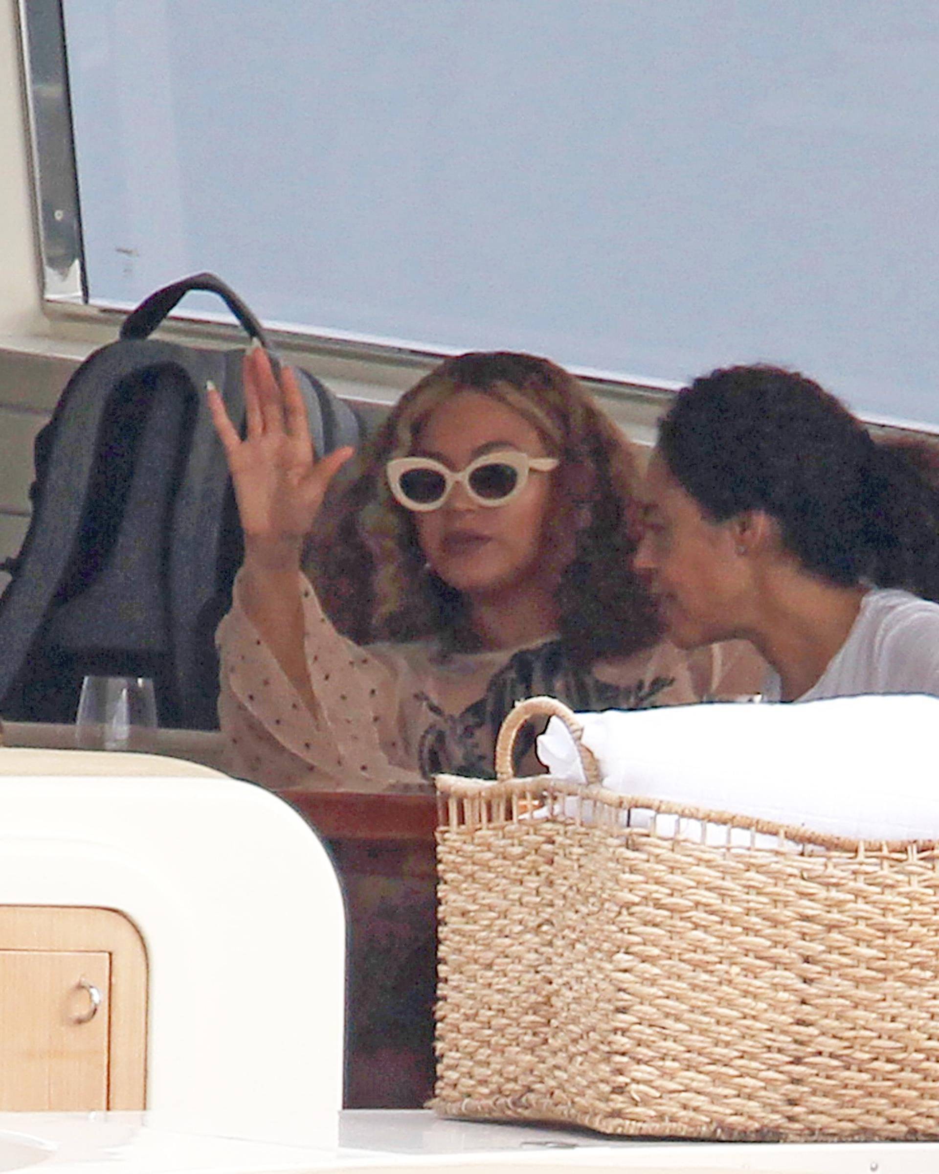 Glamor couple Jay Z and Beyonce treat friends and family to a power boat ride around Miami