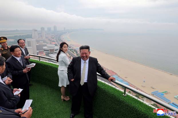 North Korean leader Kim Jong Un and his daughter Kim Ju Ae attend a ceremony to celebrate the completion of the Wonsan Kalma Coastal Tourist Zone