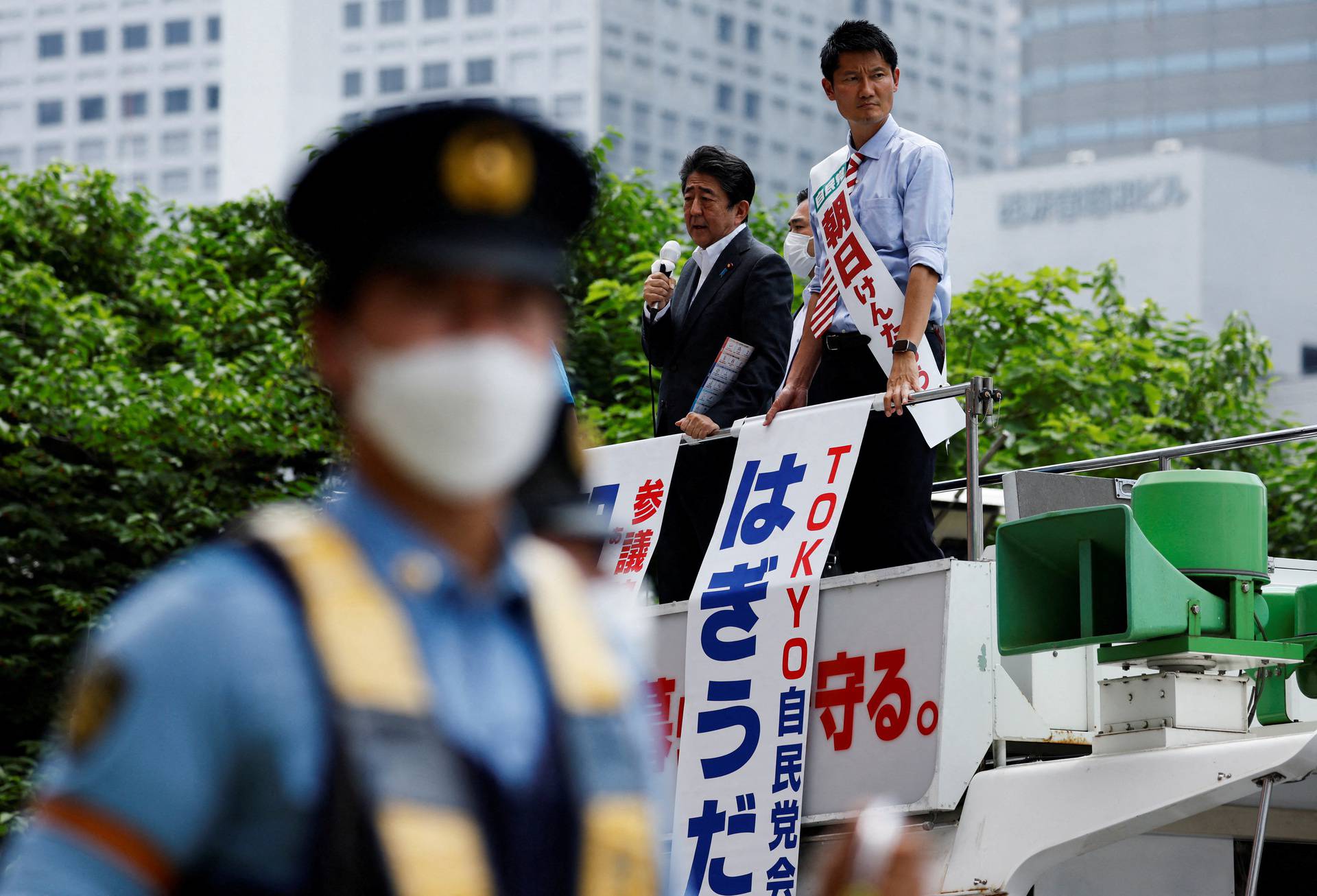 FILE PHOTO: Former Japanese PM Abe delivers a speech during an election campaign for the upcoming Upper House election in Tokyo