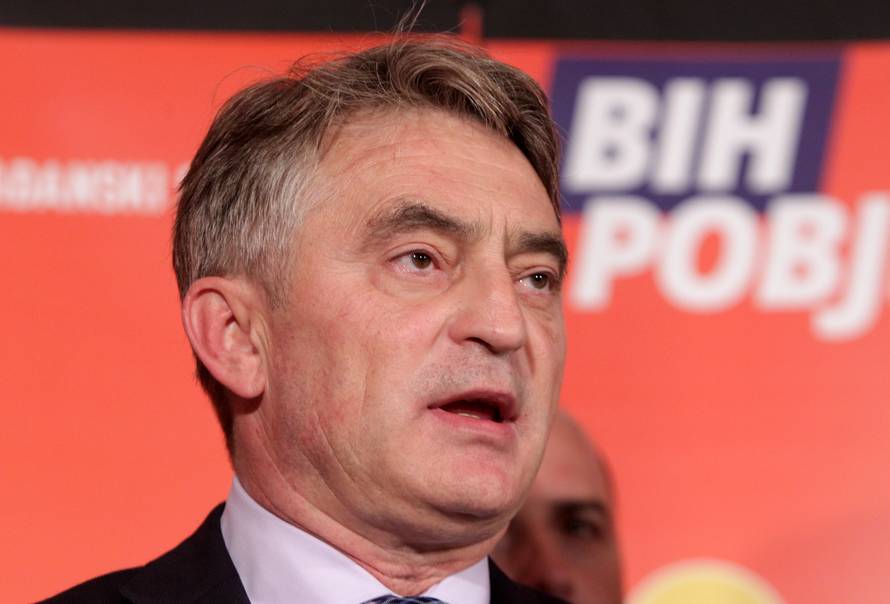 Zeljko Komsic of Democratic Front (DF) attends a news conference where he declared himself the winner of the Croat seat of the Tri-partite Bosnian Presidency in Sarajevo