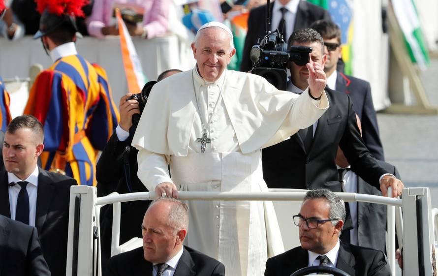 Pope Francis leaves after a Mass for the canonisation of five persons at the Vatican