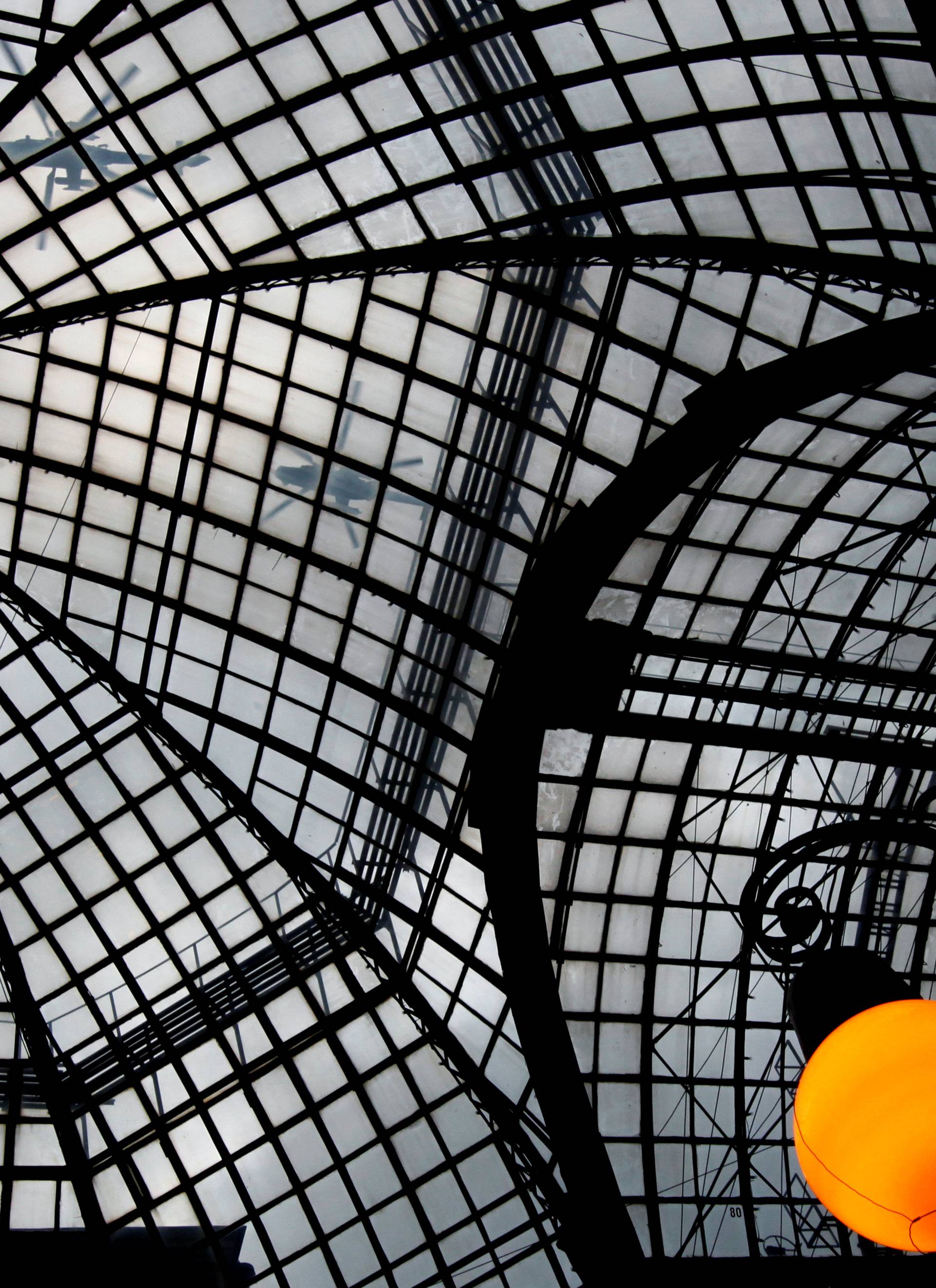 Russian Mi-35 helicopters are seen through glass roof of GUM department store during rehearsal for Victory Day parade in Red Square in Moscow