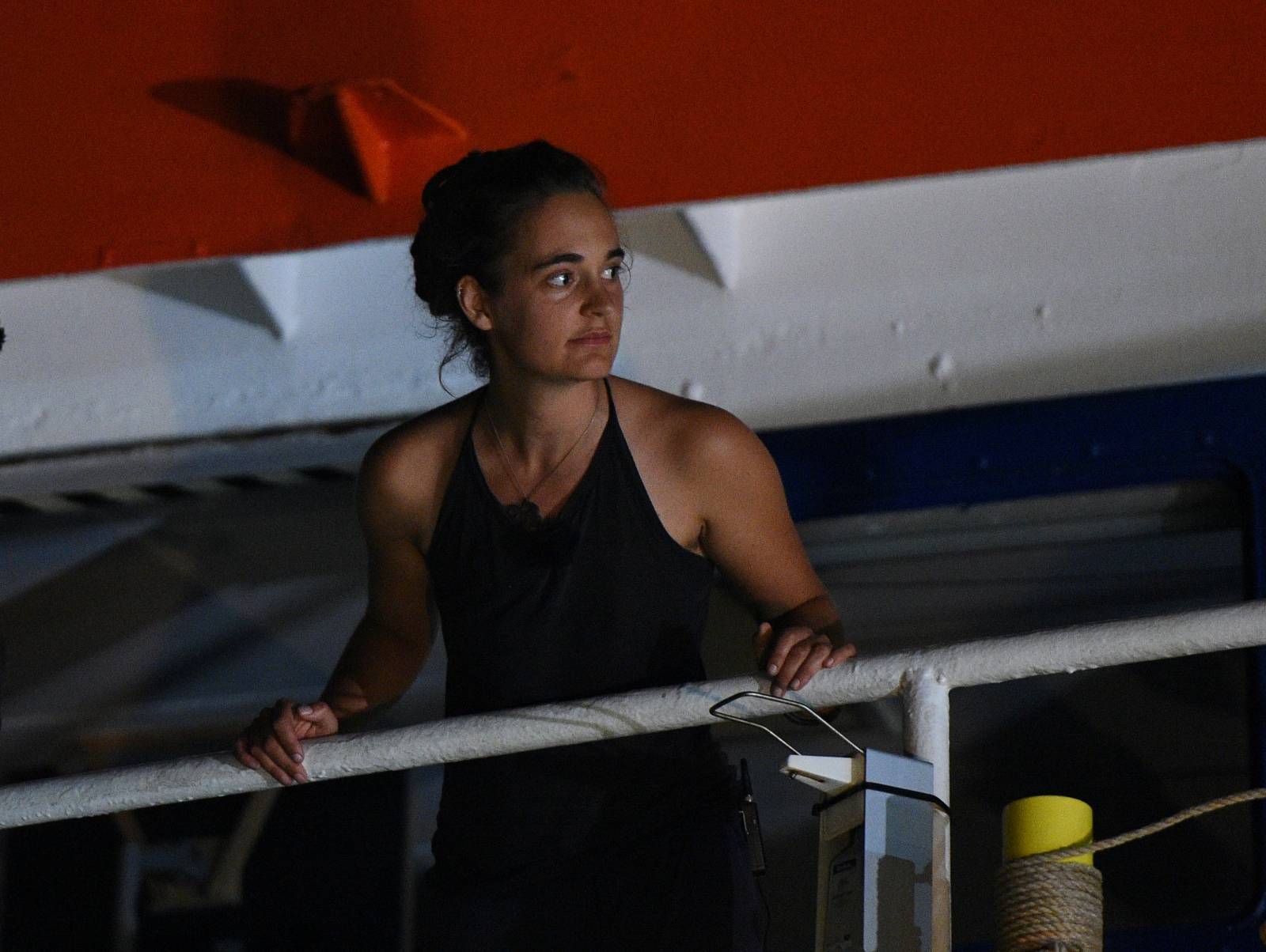 Carola Rackete, the 31-year-old Sea-Watch 3 captain, is seen onboard the ship as it docks in Lampedusa