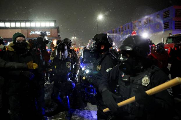 Protest outside the hotel where Bovino, who has been removed from his role, is reportedly staying, in Maple Grove
