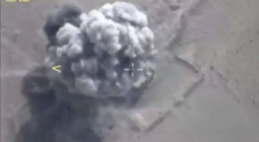 A still image shows airstrikes hitting what the Defence Ministry says was an Islamic State target in Deir al-Zor province