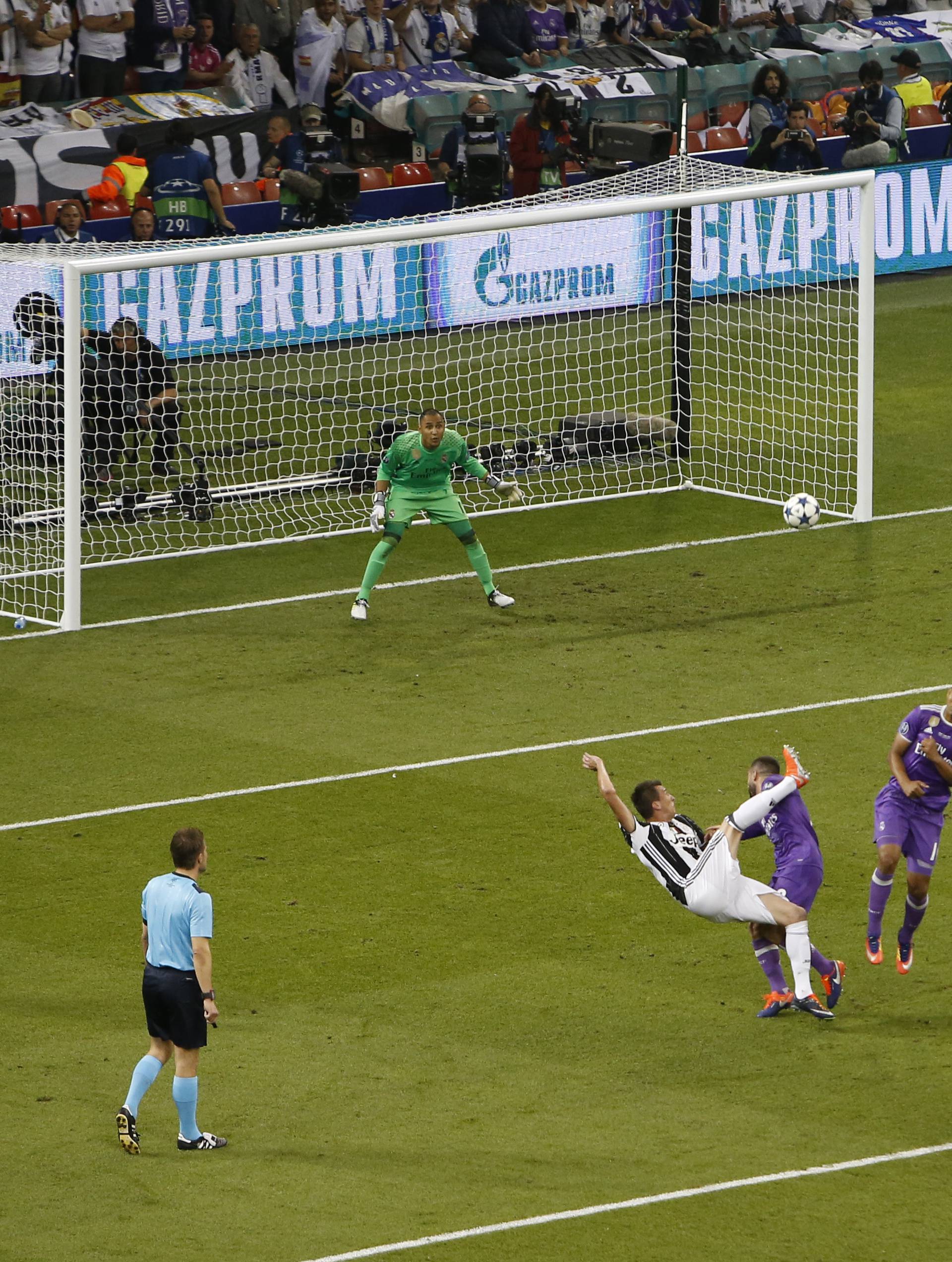 Juventus' Mario Mandzukic scores their first goal