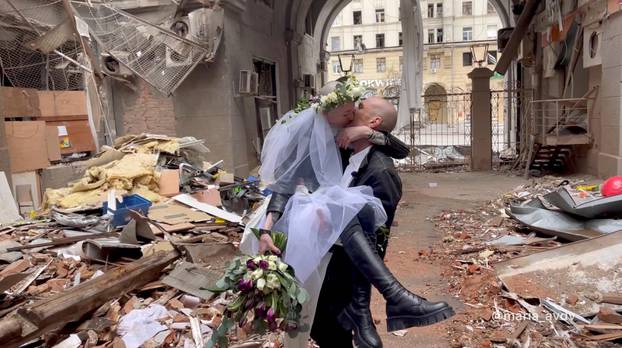 Ukrainian bride and groom, amid Russia's invasion of Ukraine, in Kharkiv