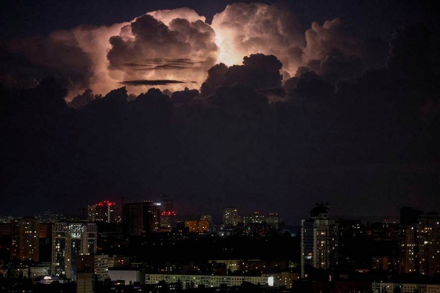 Lightning illuminates sky during air raid alert in Kyiv