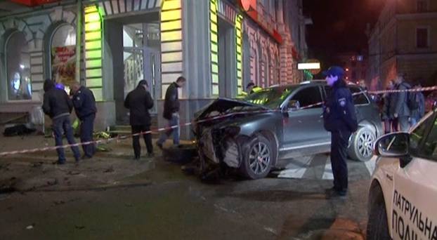 A still image taken from a video shot on October 18, 2017, shows an accident scene after a car drove into pedestrians following a vehicle collision in central Kharkiv