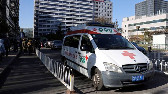 FILE PHOTO: Ambulance leaves a children's hospital in Beijing