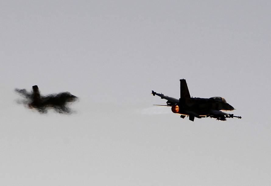 FILE PHOTO- Israeli Air Force F-16 fighter jets take part in a ceremony for newly graduated air force pilots at Hatzerim Air Base