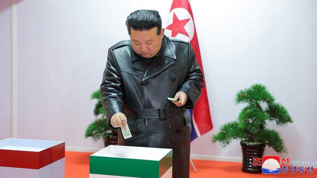 North Korea's leader Kim Jong-un casts his ballot during a local election, in South Hamgyong Province