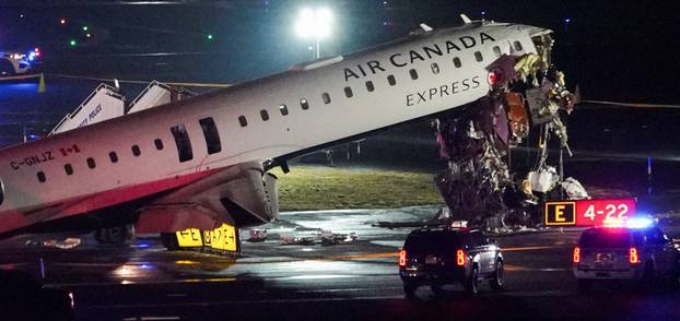 Air Canada Express jet collides with a ground vehicle at LaGuardia airport