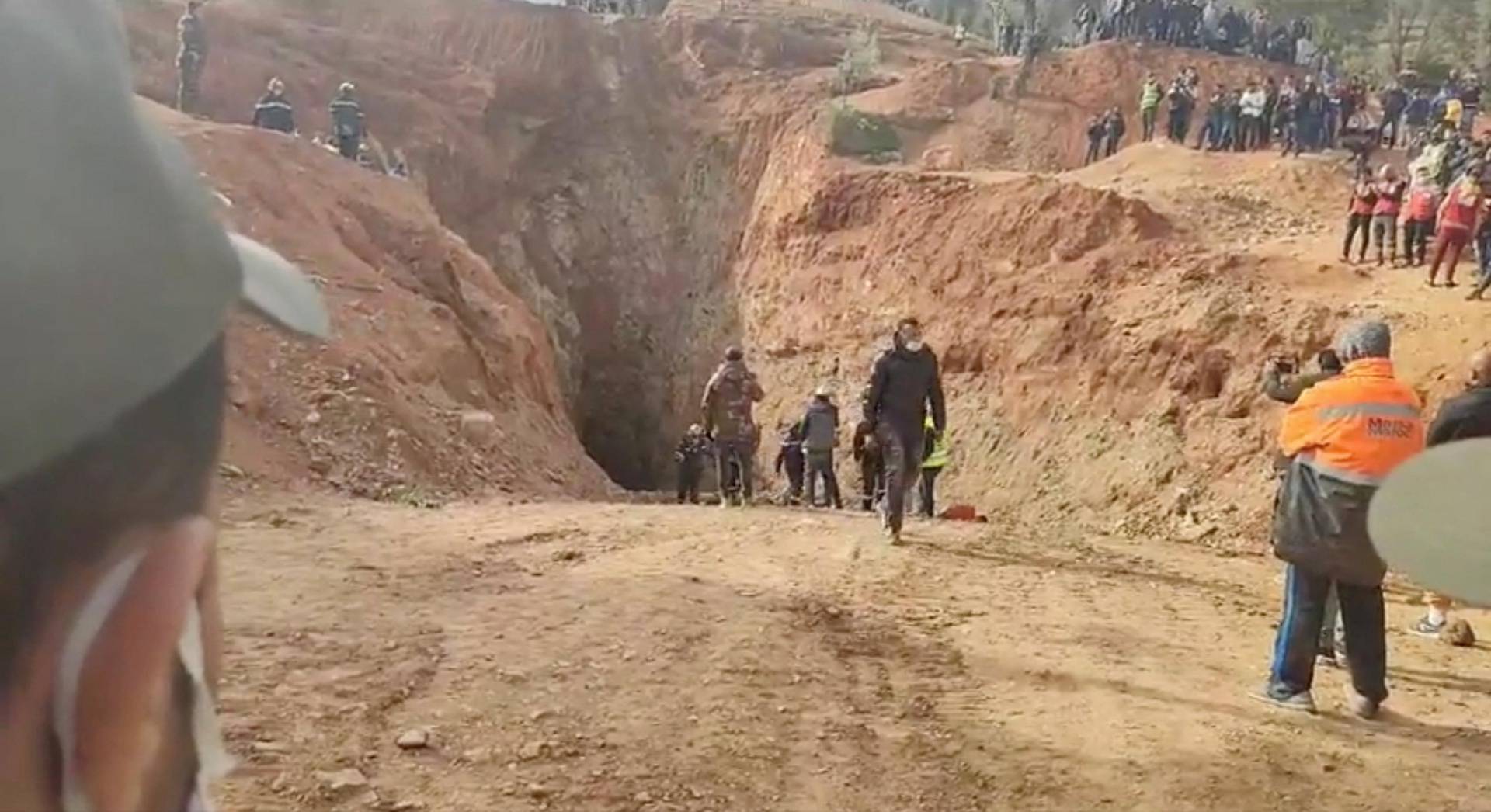 Rescuers mission to free a boy trapped in an underground well, in Chefchaouen