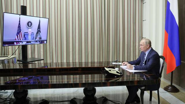 Russian President Vladimir Putin holds talks with U.S. President Joe Biden via a video link in Sochi