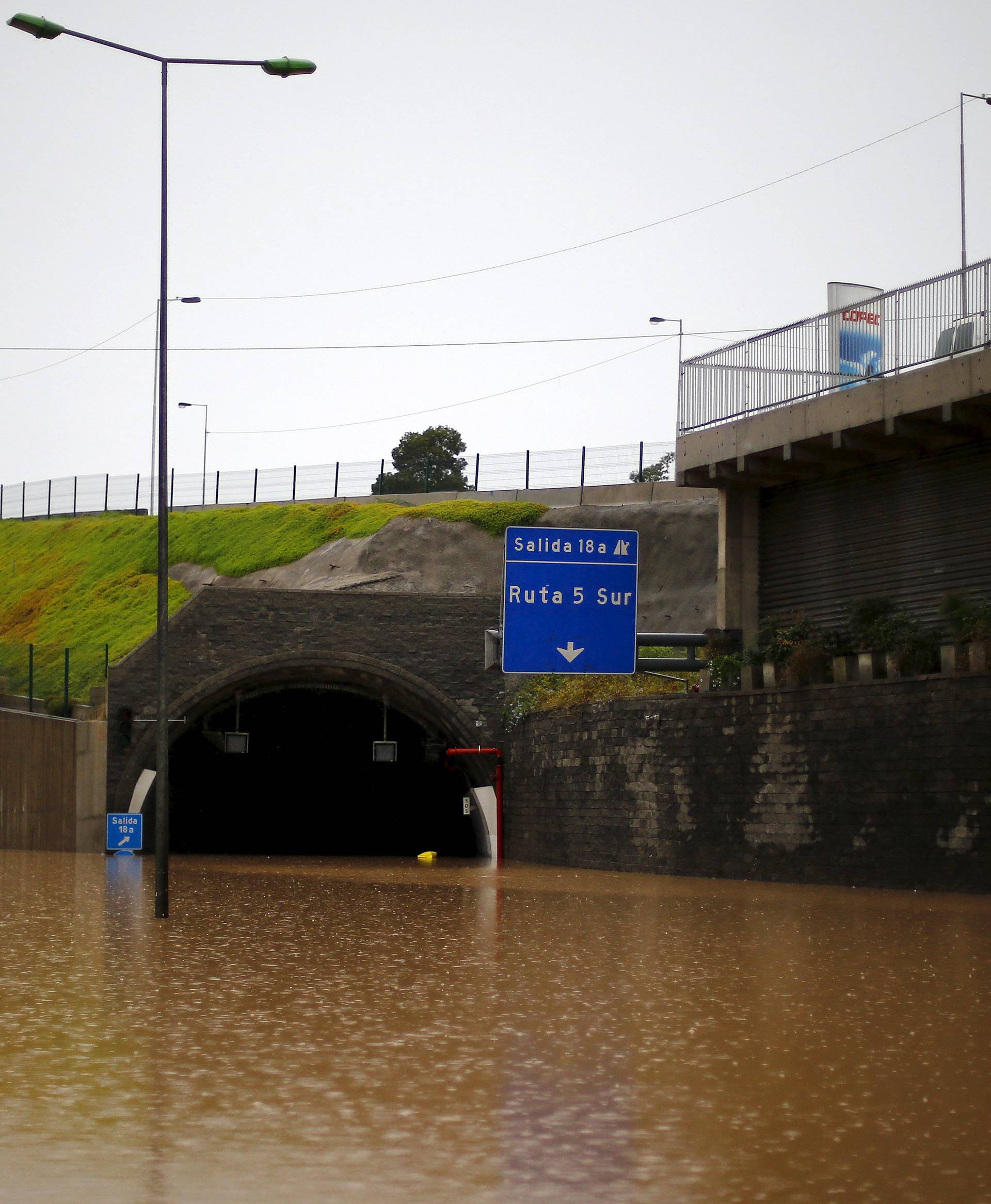 A view of a flooded highway access in Santiago