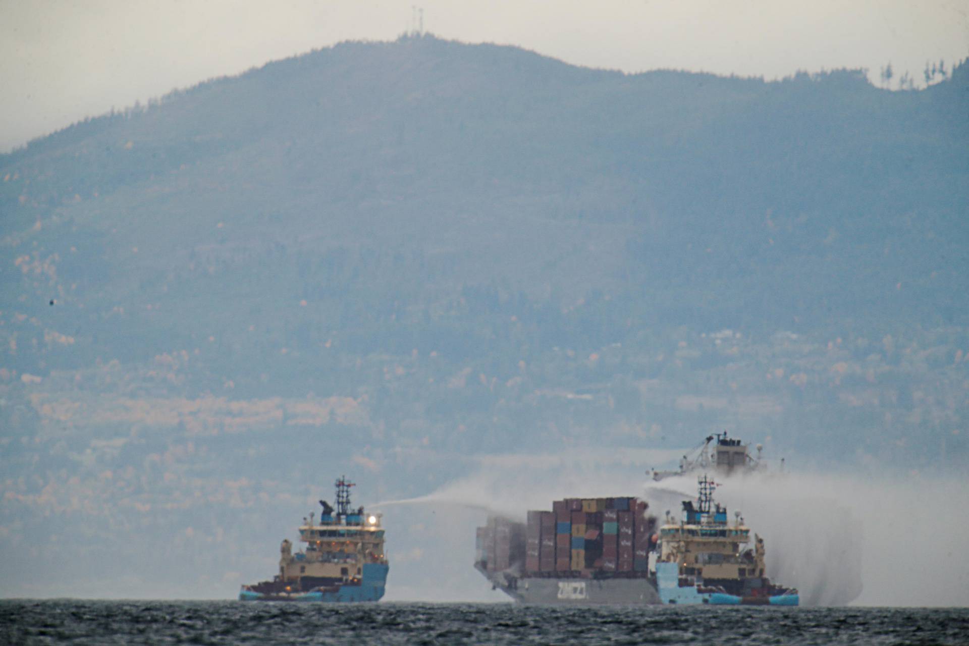 Container ship Zim Kingston evacuated due to a fire on board near Victoria
