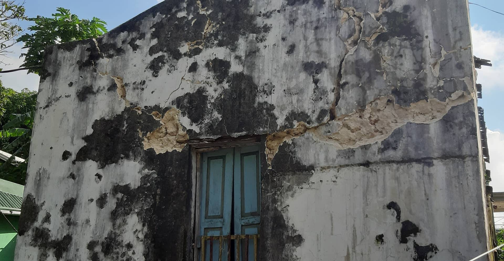 Cracks are seen on the facade of a building after an earthquake struck the Batanes Province, in northern Philippines