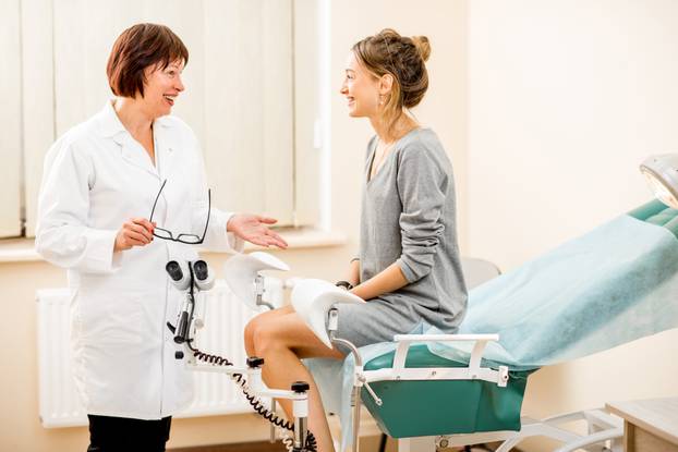 Young,Woman,Patient,With,A,Senior,Gynecologist,During,The,Consultation