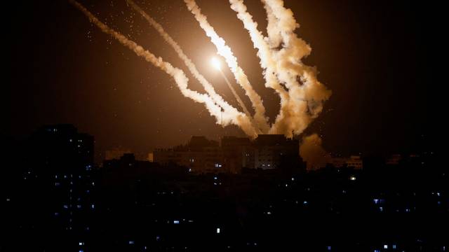 Rockets are fired from Gaza into Israel, in Gaza