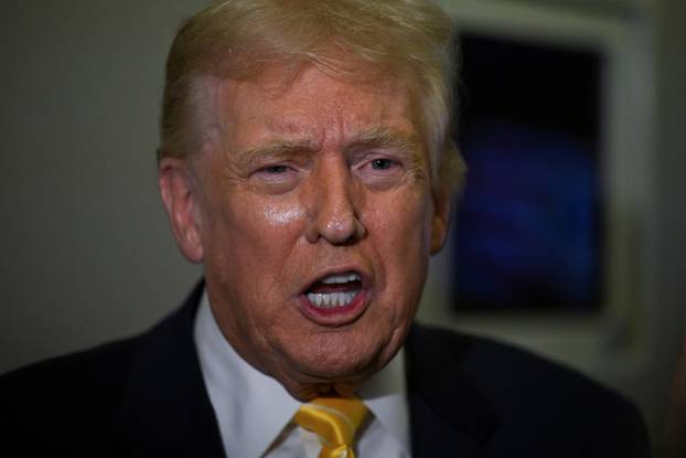 U.S. President Trump on board Air Force One for travel to Palm Beach, Florida