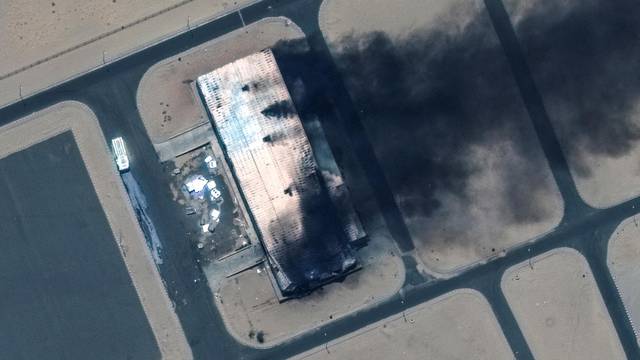 Satellite image shows a closer view of a burning building at the Merowe Airbase