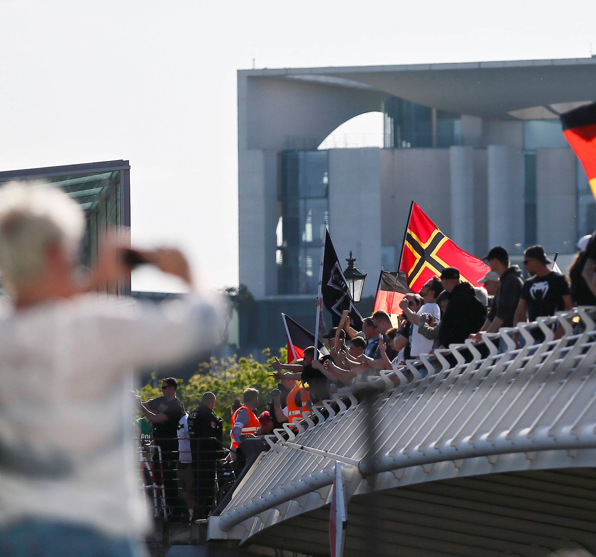 Right-wing protestors demonstrate in front of the chancellery in Berlin