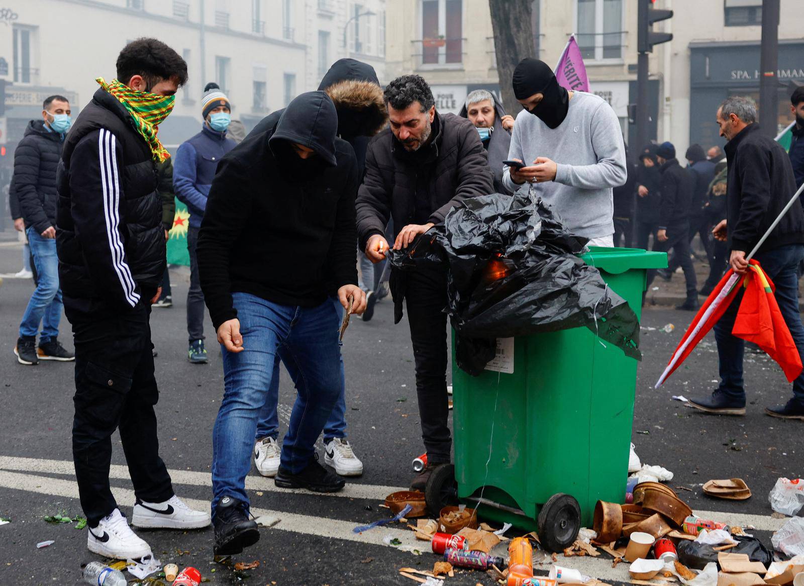 Members of the Kurdish community gather at the Place de la Republique square following the shooting, in Paris