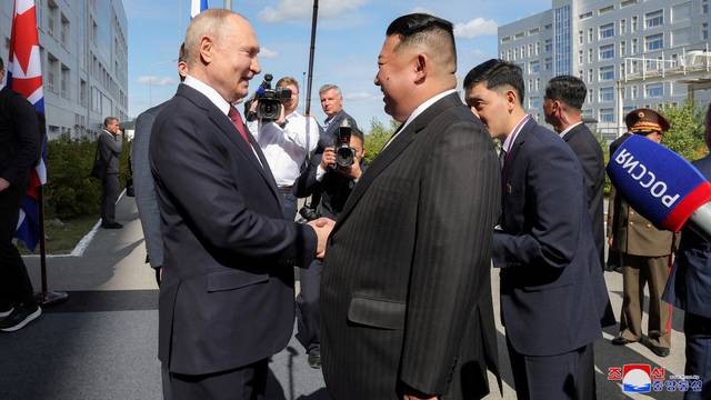 FILE PHOTO: North Korean leader Kim Jong Un meets Russia's President Vladimir Putin