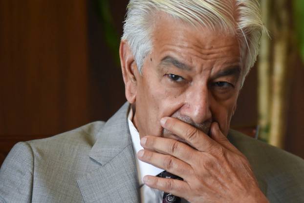 Pakistan’s Defence Minister Khawaja Muhammad Asif looks on during an interview with Reuters in Islamabad