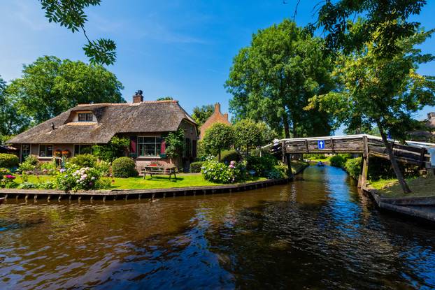 view of famous village Giethoorn with canals in the Netherland