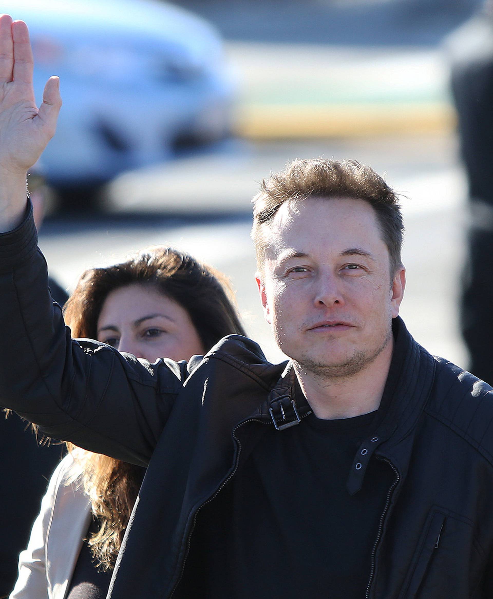 Elon Musk, founder and CEO of SpaceX arrives with Los Angeles Mayor Eric Garrett for the SpaceX Hyperloop Pod Competition in Hawthorne, Los Angeles