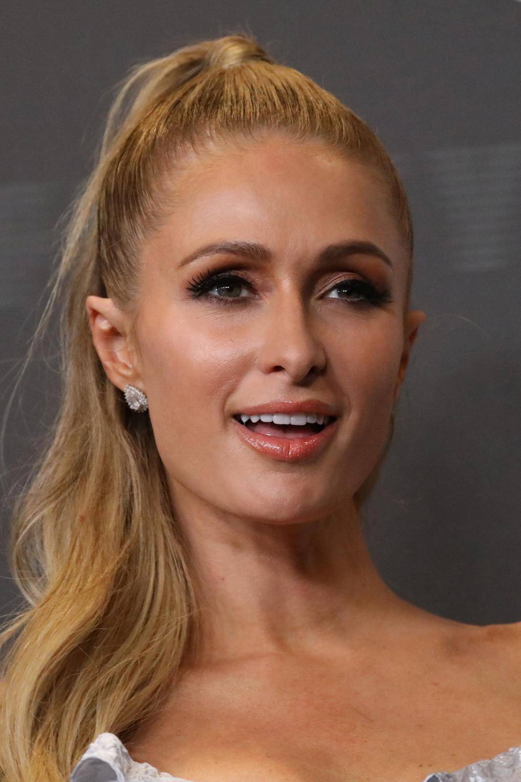 Paris Hilton poses on the red carpet of Rihanna's new Savage X Fenty collection show for New York Fashion Week at the Barclays Center in the Brooklyn