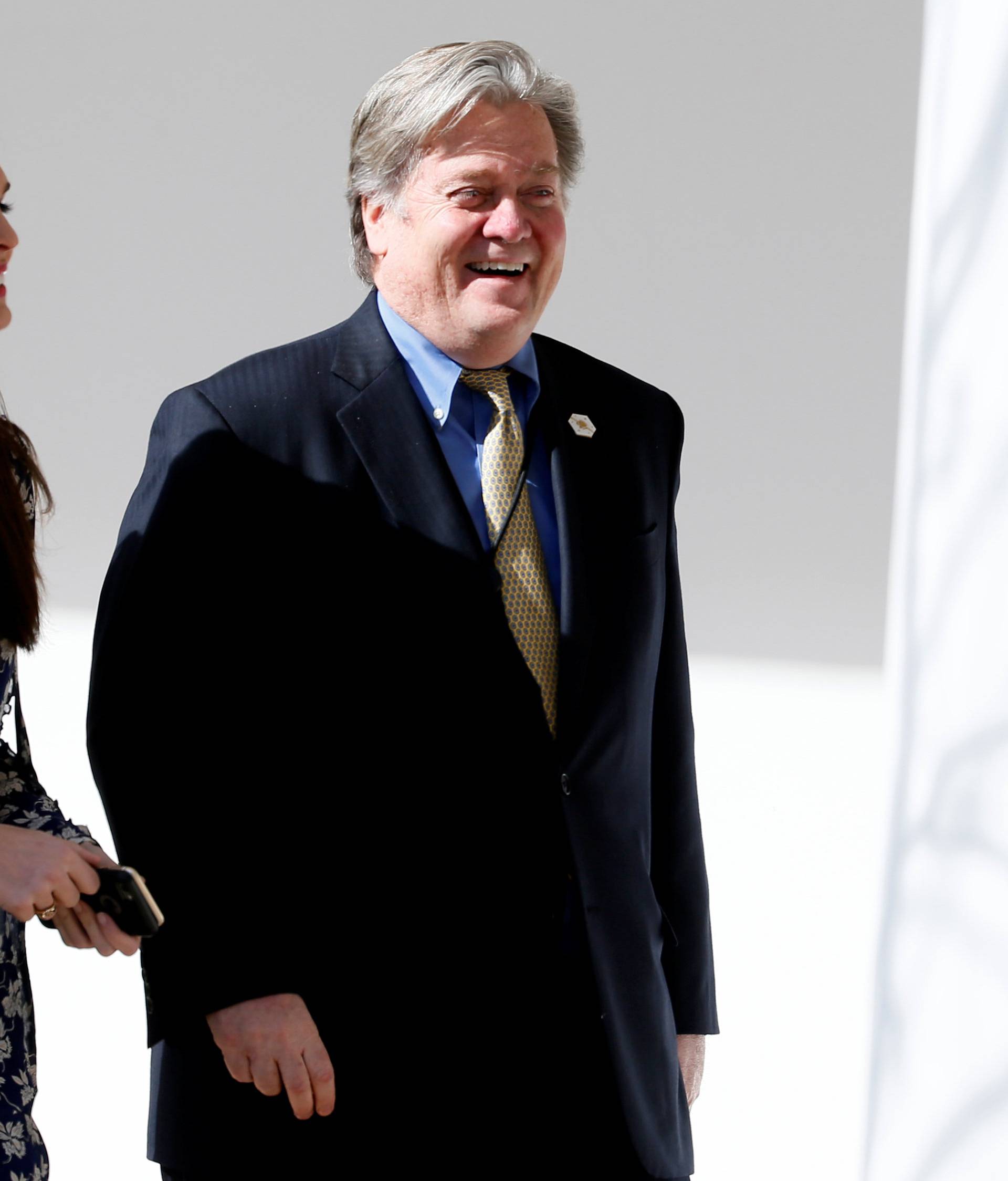 White House Chief Strategist Bannon and senior adviser Hicks walk to joint press conference at the White House in Washington