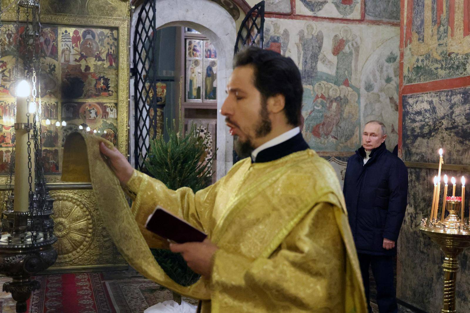 Russian President Vladimir Putin attends the Orthodox Christmas service in Moscow