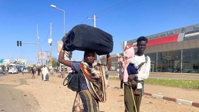 People gather at the station to flee from Khartoum