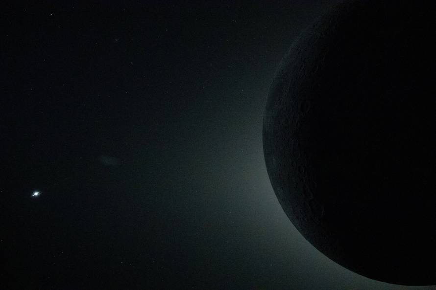 The Moon fully eclipsed by the Sun during the Artemis II crew’s flyby of the Moon