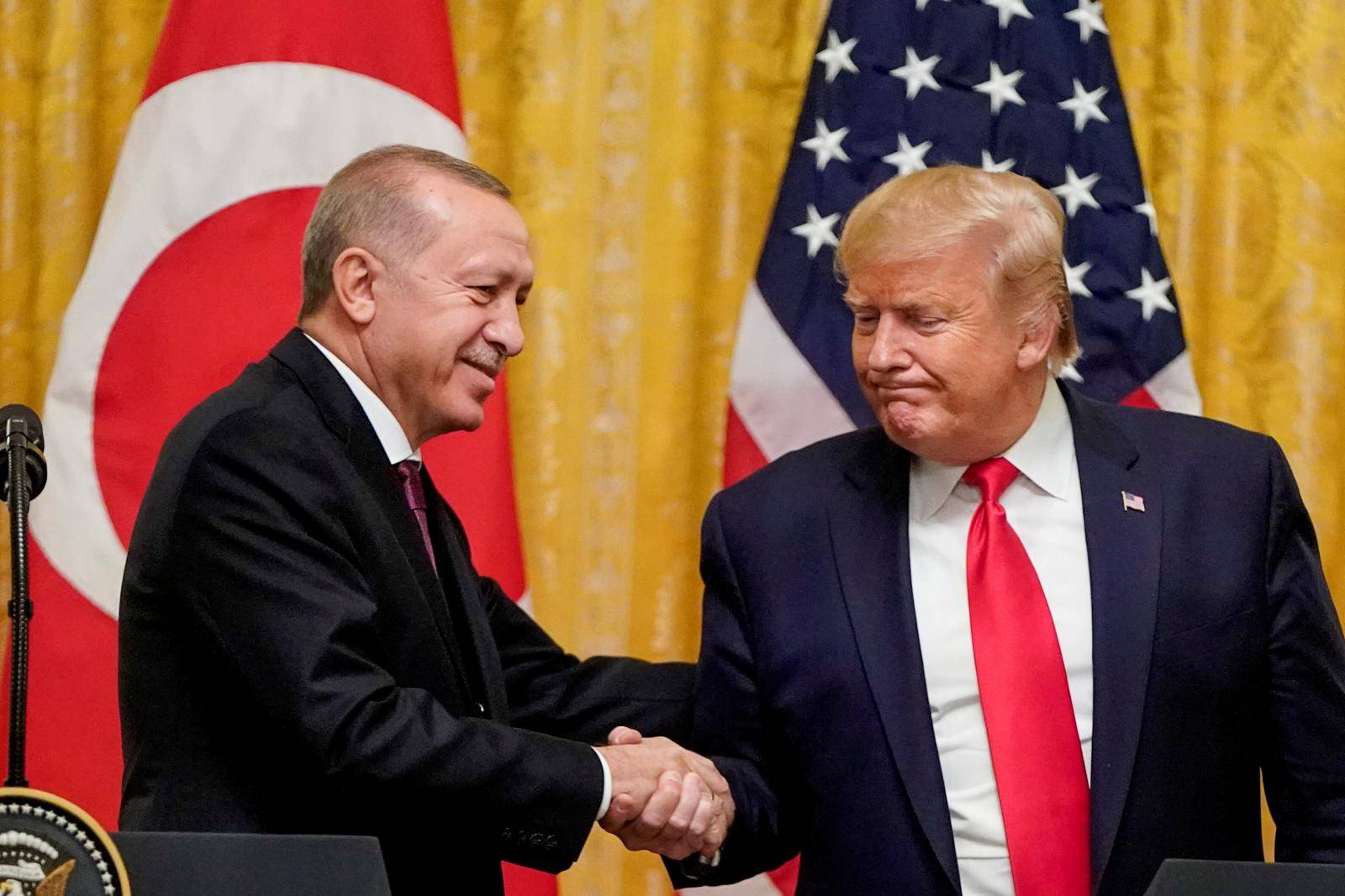FILE PHOTO: U.S. President Donald Trump and Turkey's President Tayyip Erdogan hold a joint news conference at the White House in Washington