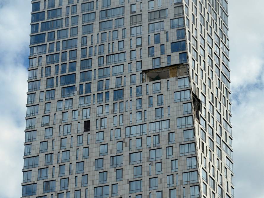 The damaged facade of a high-rise building following a drone attack, amid the Russia-Ukraine conflict, in Moscow