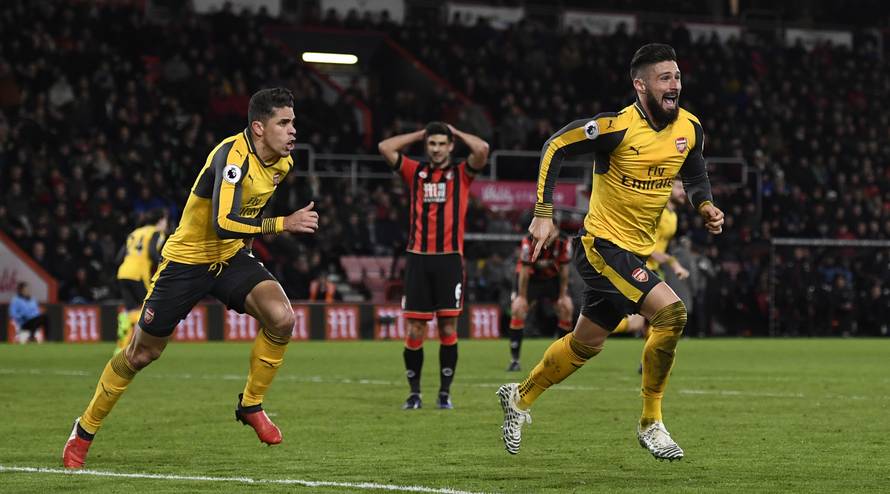 Arsenal's Olivier Giroud celebrates scoring their third goal