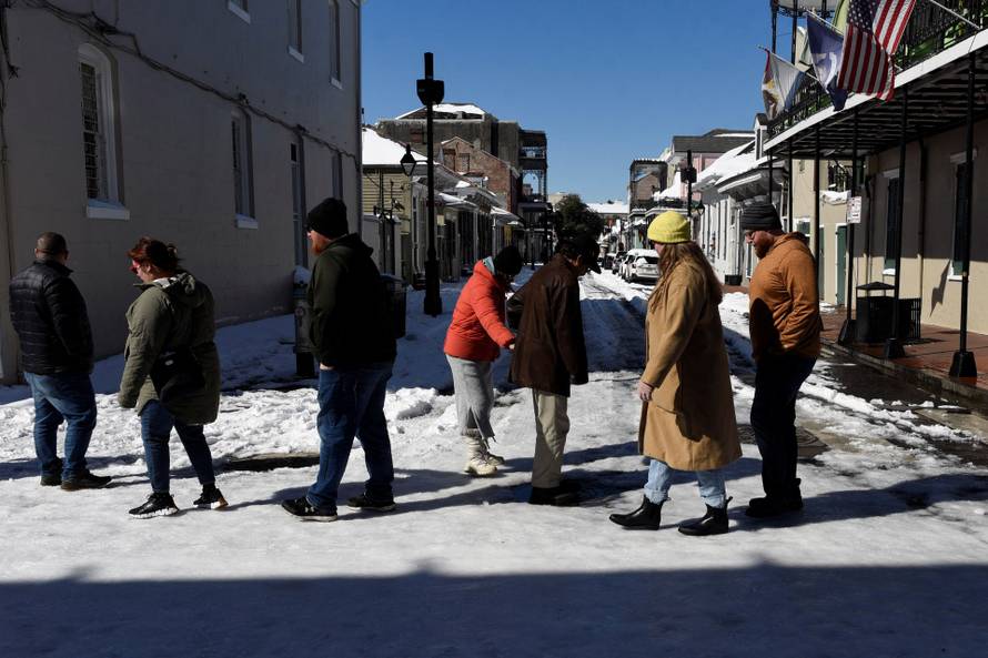 Rare winter snow storm churns across the U.S. Gulf Coast