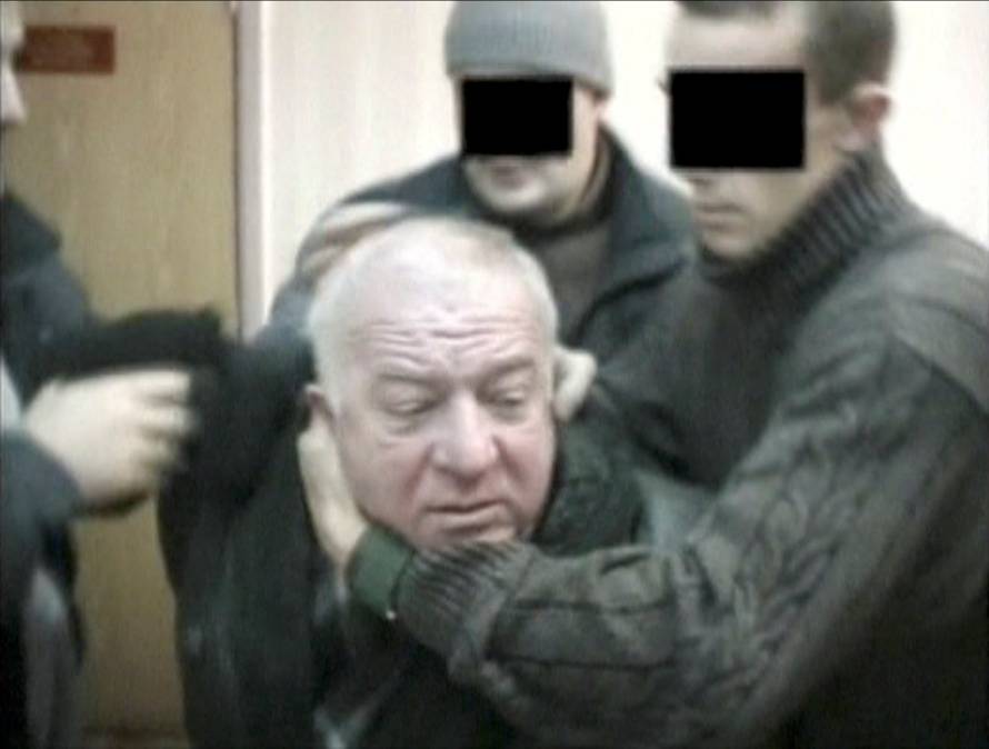 A still image taken from an undated video shows Sergei Skripal, a former colonel of Russia's GRU military intelligence service, being detained by secret service officers in an unknown location.