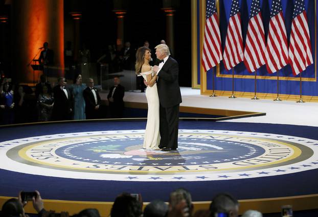 U.S. President Donald Trump and his wife first lady Melania Trump dance at the "Salute to Our Armed Forces" inaugural ball during inauguration festivites in Washington