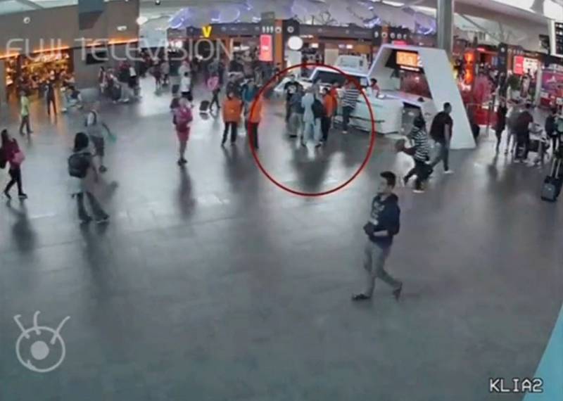 Video grab appears to show a man purported to be Kim Jong Nam talking to airport staff, after being accosted by a woman in a white shirt, at Kuala Lumpur International Airport in Malaysia