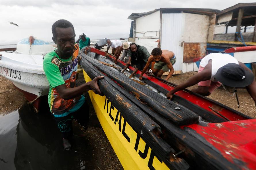 Jamaicans make preparations ahead of the arrival of Hurricane Melissa